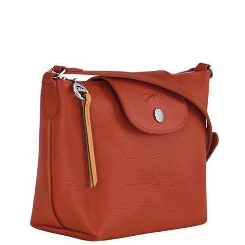 Sac porté travers à rabat en toile enduite LONGCHAMP gamme Le Pliage City couleur orange