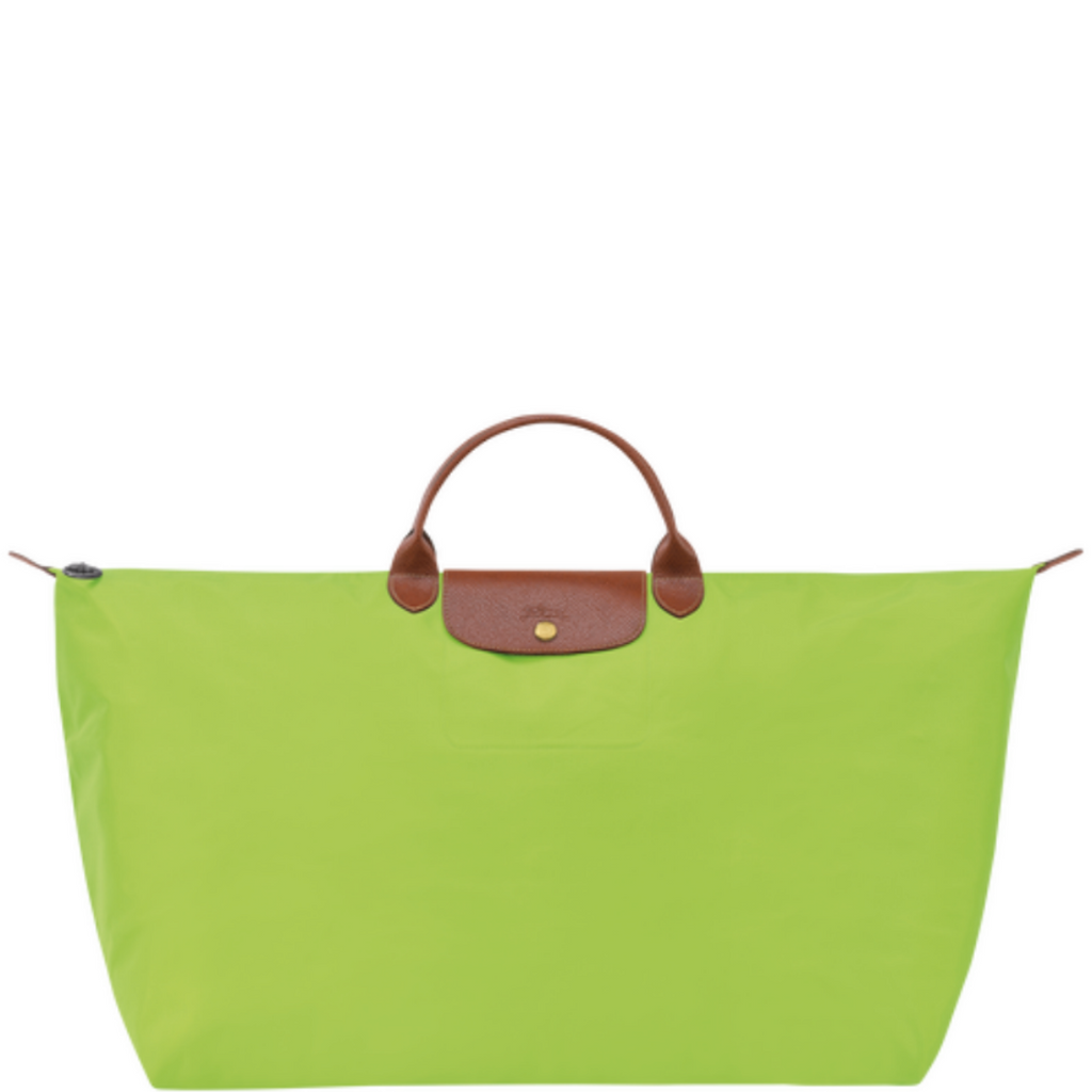 Grand sac de voyage en toile et cuir LONGCHAMP gamme Le Pliage Original couleur vert clair