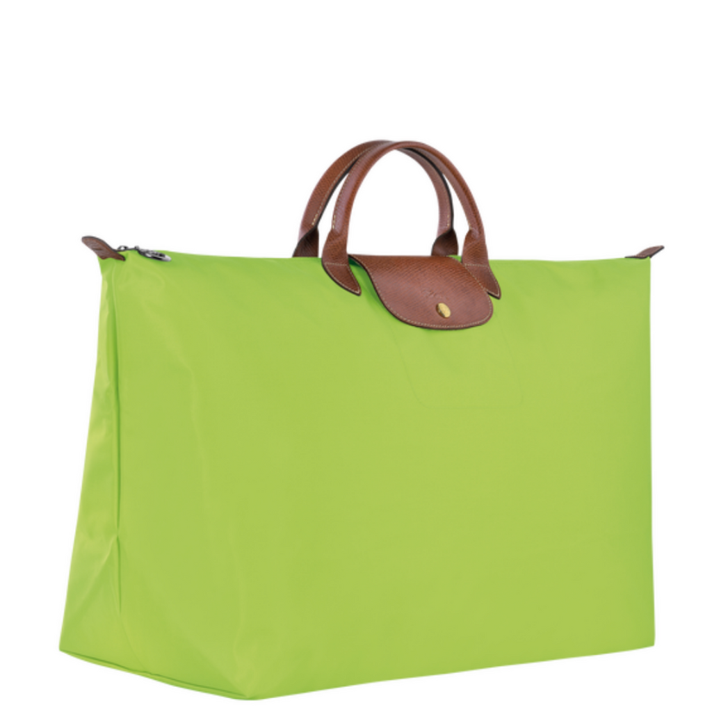 Grand sac de voyage en toile et cuir LONGCHAMP gamme Le Pliage Original couleur vert clair