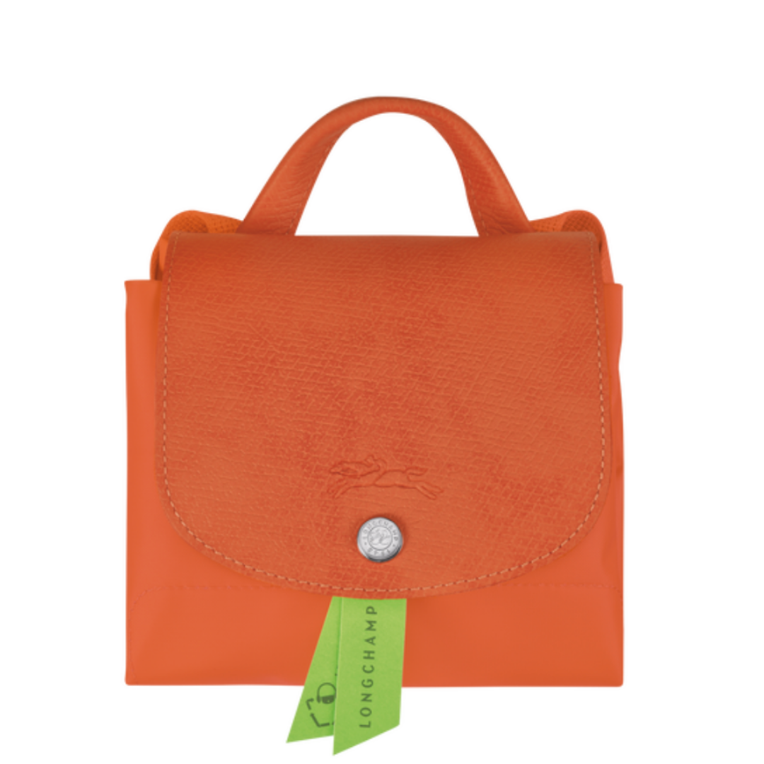 Sac à dos en toile et cuir LONGCHAMP gamme Le Pliage Green couleur orange carotte