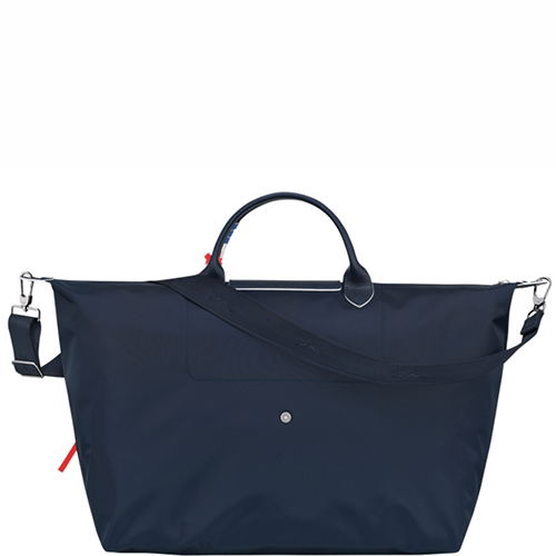 Sac de voyage en toile LONGCHAMP gamme Le Pliage Très Paris couleur bleu marine