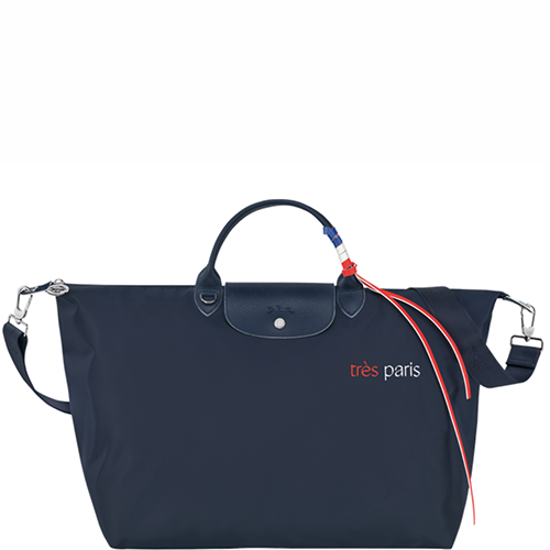 Sac de voyage en toile LONGCHAMP gamme Le Pliage Très Paris couleur bleu marine