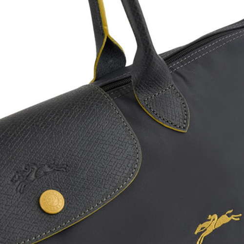 Grand sac de voyage en toile et cuir LONGCHAMP gamme Le Pliage Club couleur gris fusil