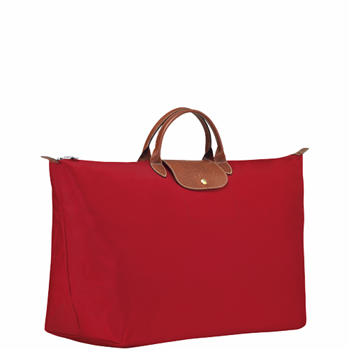 Grand sac de voyage en toile et cuir LONGCHAMP gamme Le Pliage Original couleur rouge